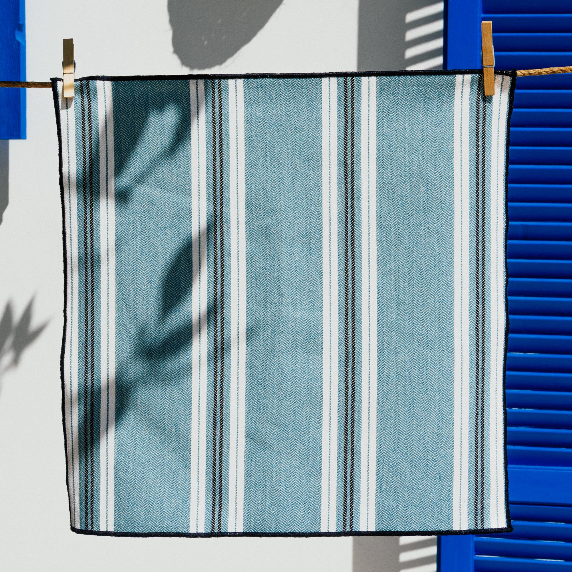 Servilleta de rayas azul